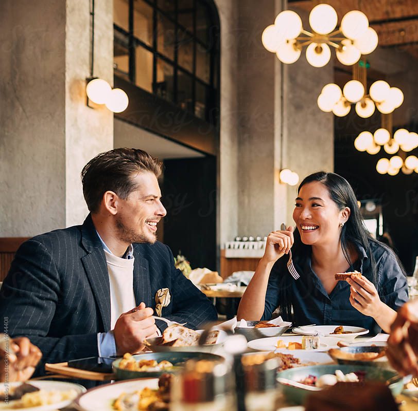 Friends enjoying dinner at a restaurant